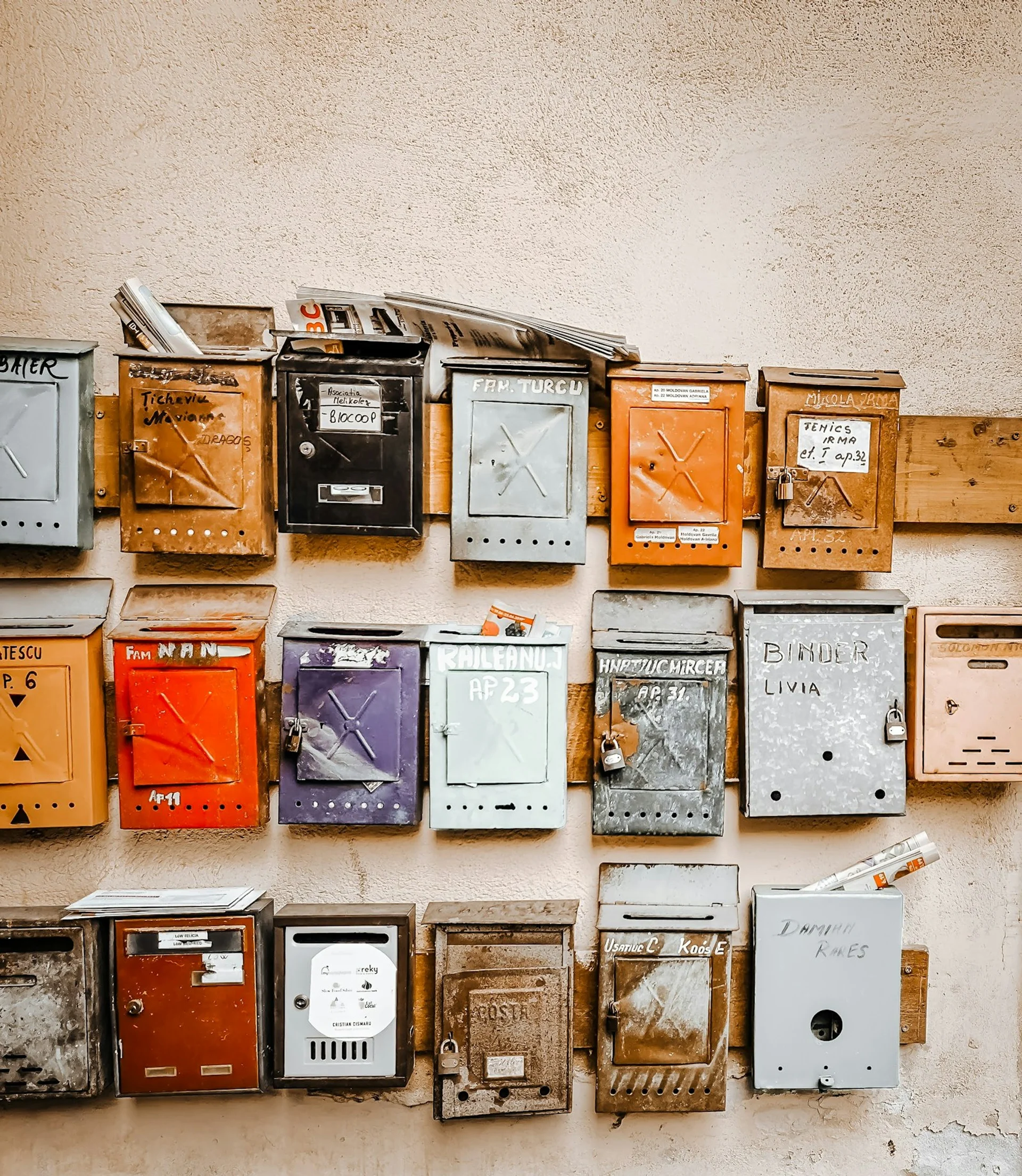 A wall of mailboxes ready to receive mail